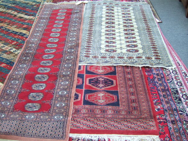 Appraisal: An Indian Bokhara rug the ivory field with two columns