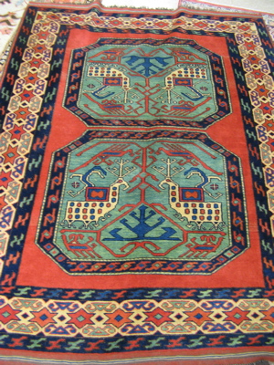 Appraisal: ORIENTAL AREA RUG double octagonal medallion design on red ground