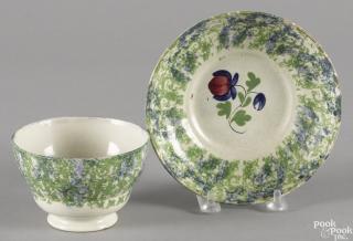 Appraisal: Blue and green sponge spatter cup and saucer with rose