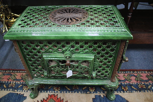 Appraisal: A 'S FRENCH GREEN ENAMELLED CHAUFFETTE WOOD BURNING STOVE by