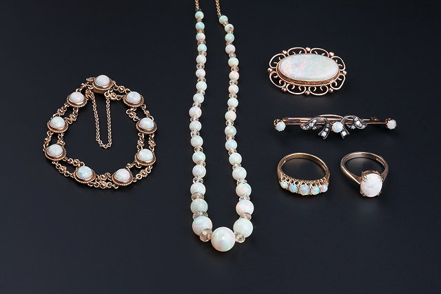 Appraisal: A COLLECTION OF OPAL SET JEWELLERY comprising a cabochon opal