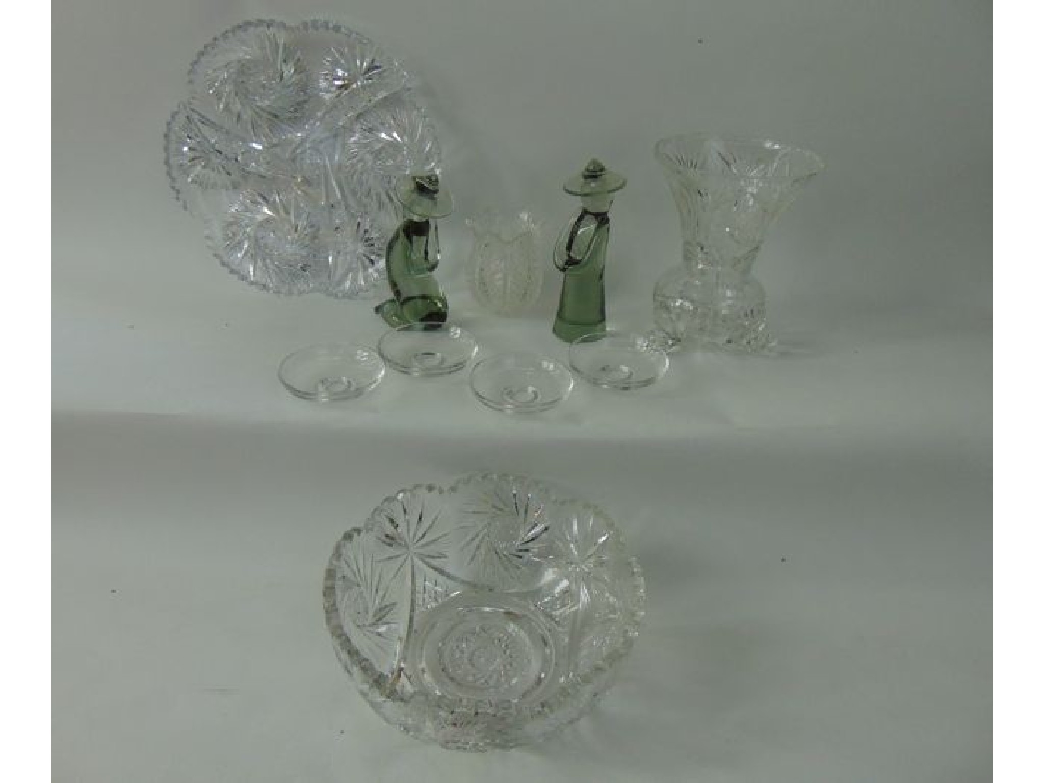 Appraisal: A set of four glass drip pans with moulded mark