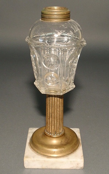 Appraisal: Whale oil lamp with a clear glass font and marble