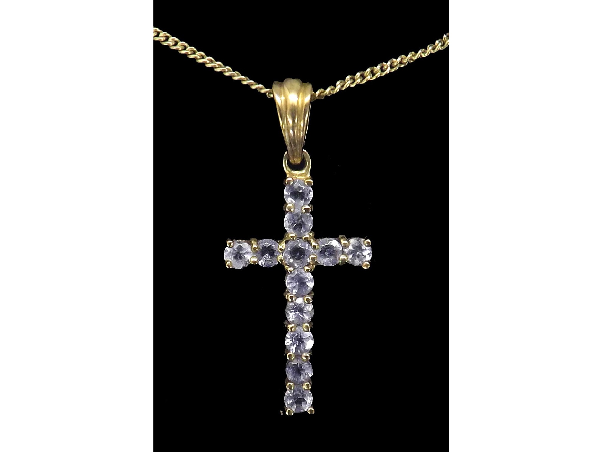 Appraisal: ct tanzanite cross pendant on a slender necklet pendant mm