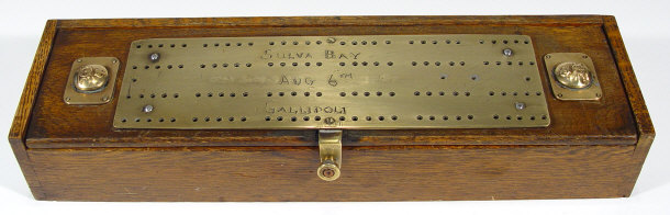 Appraisal: Oak military interest games box with brass cribbage board lid