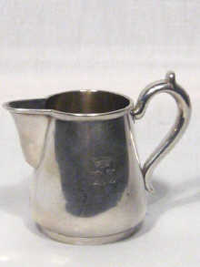 Appraisal: Russian Interest A Russian silver cream jug of tapering cylindrical