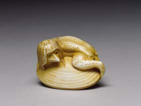 Appraisal: ANTIQUE IVORY NETSUKE Antique carved ivory netsuke of a kappa