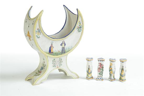 Appraisal: QUIMPER KNIFE RESTS AND CRESCENT VASE France late th-early th