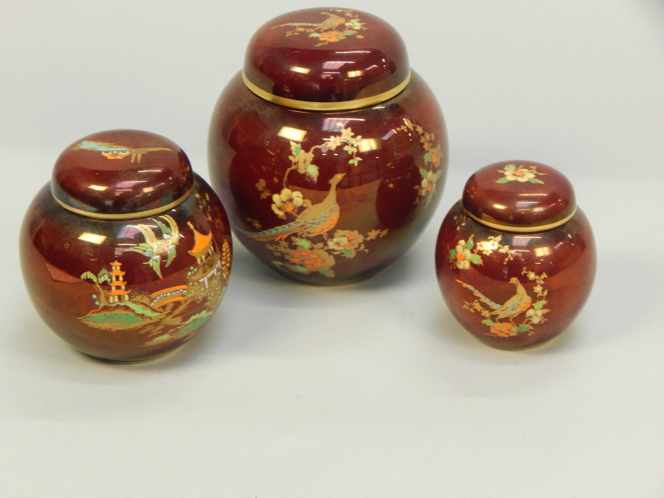 Appraisal: Three Carlton Ware Rouge Royal ginger jars and covers each