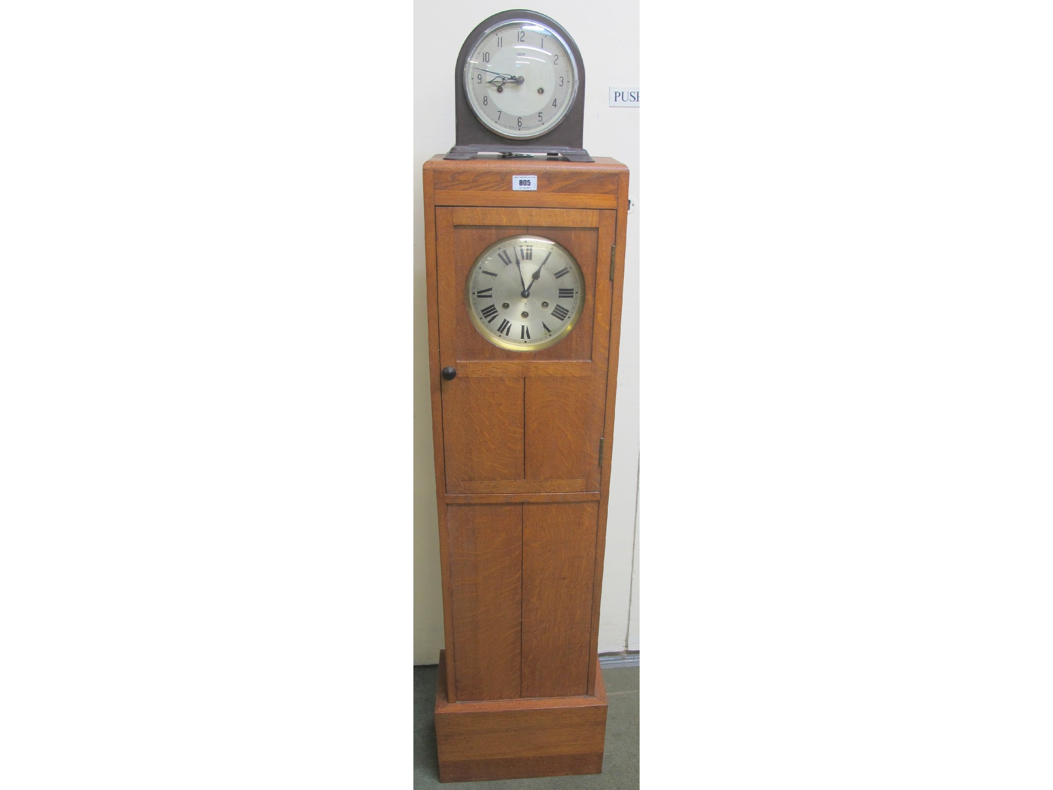 Appraisal: A th Century oak grandmother clock and a Bakelite Smiths