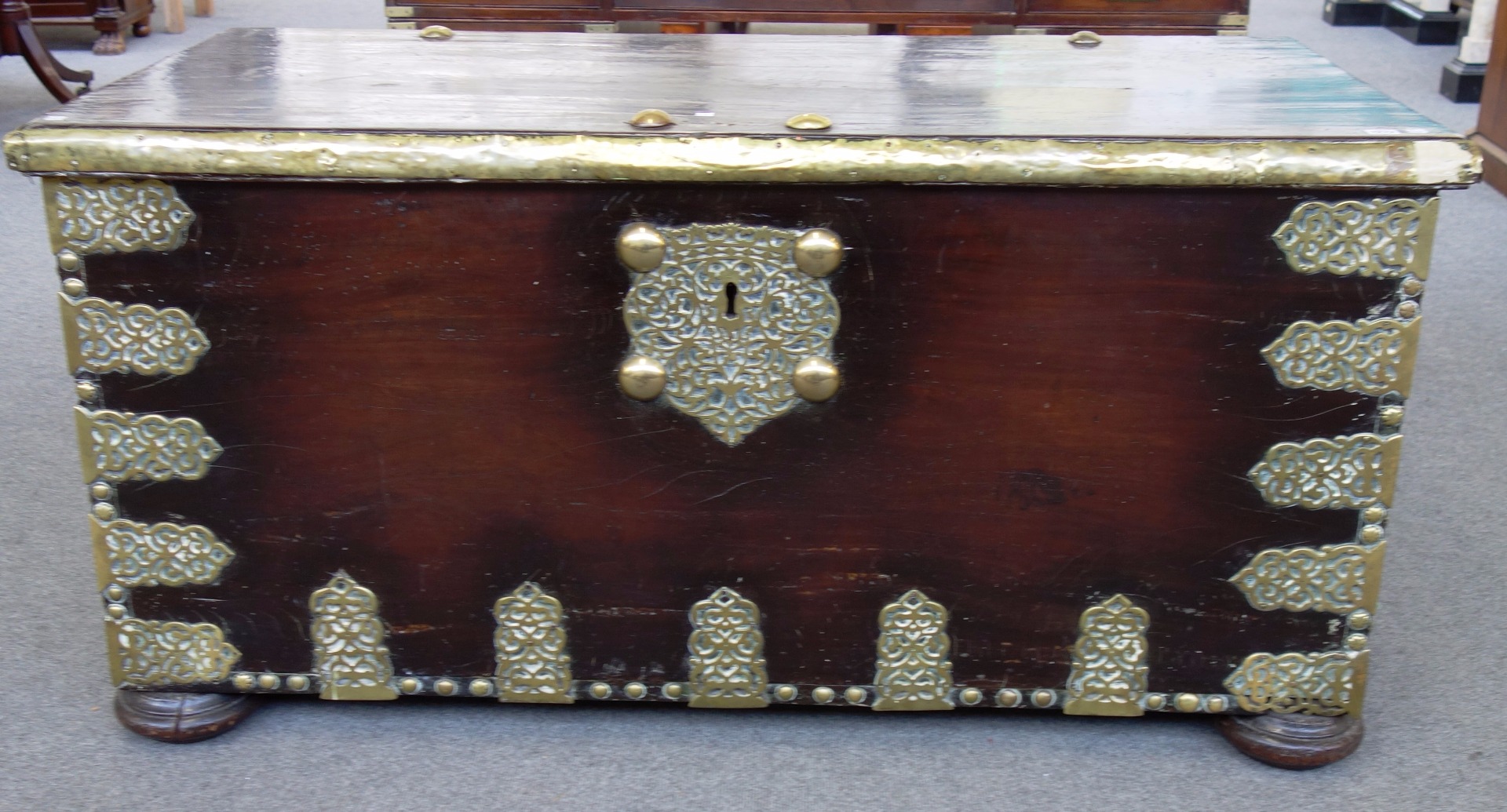 Appraisal: A th century brass bound Ceylonese mahogany chest with side