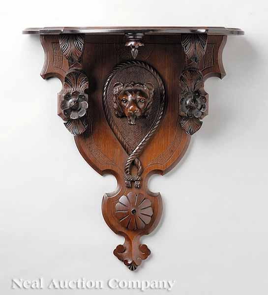 Appraisal: An American Renaissance Carved Walnut Bracket Shelf c with a