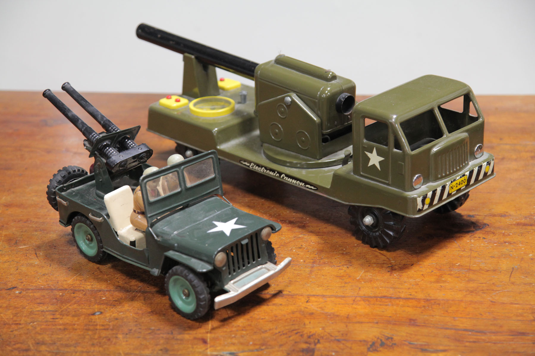 Appraisal: TWO ARMY TRUCKS American and Japanese mid th century A