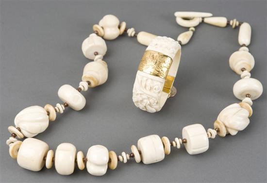 Appraisal: Chinese carved ivory bangle bracelet and ivory necklace Chinese ivory