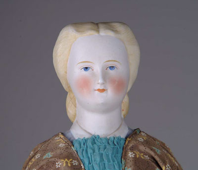 Appraisal: UNUSUAL PARIAN DOLL This young lady with a molded blouse