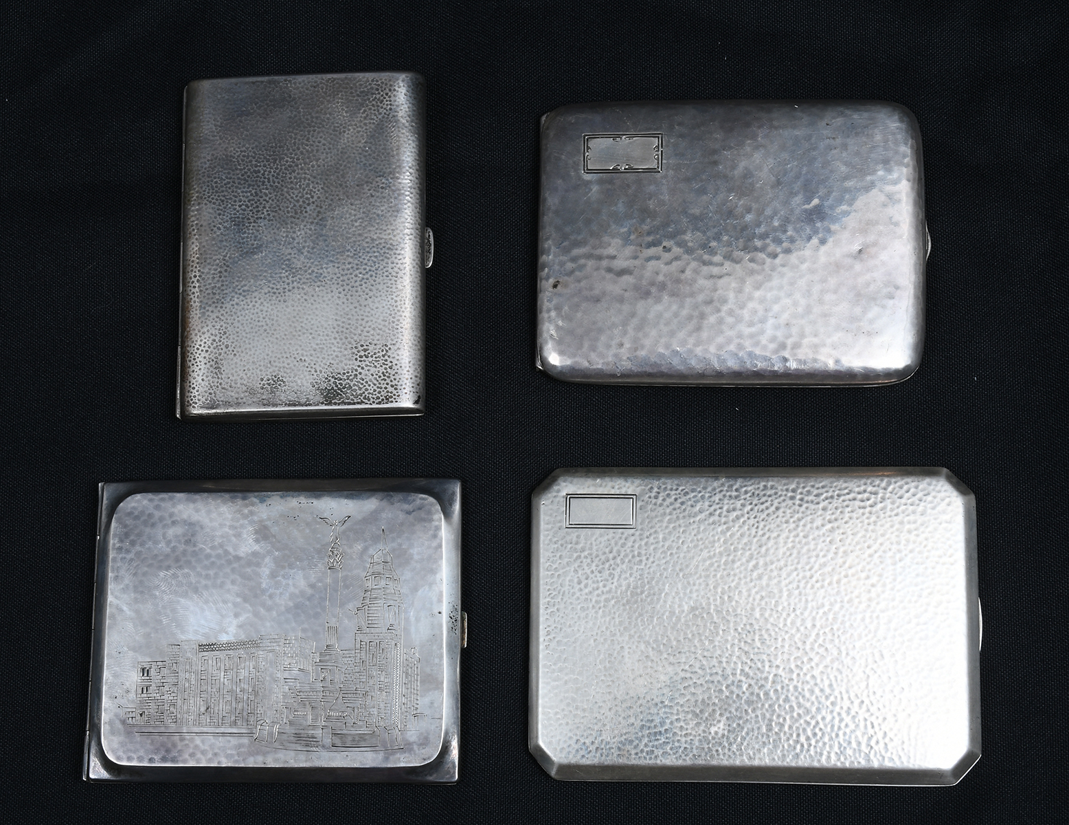 Appraisal: HAMMERED ART DECO STERLING CIGARETTE CASES Comprising - Unknown maker