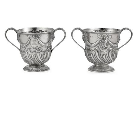 Appraisal: Companion Pair of George II Silver Cups Estimate -