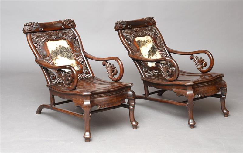 Appraisal: PAIR OF CHINESE EXPORT CARVED HARDWOOD ARMCHAIRS WITH DREAMSTONE PANELS