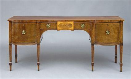 Appraisal: GEORGE III INLAID MAHOGANY SIDEBOARD The mahogany-veneered top above a