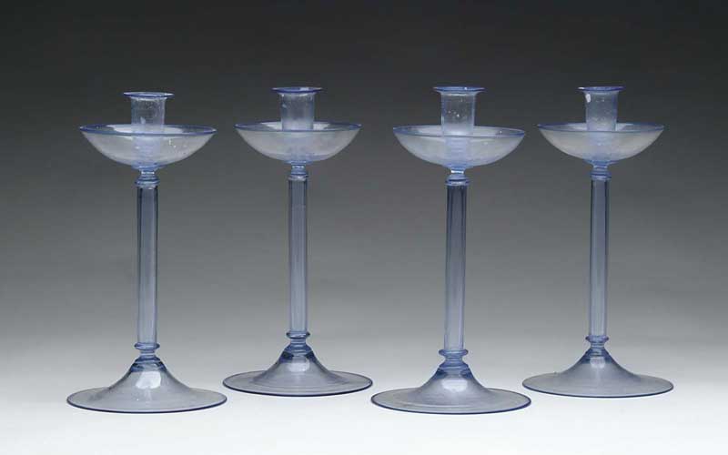 Appraisal: SET OF FOUR VENETIAN GLASS CANDLESTICKS Round base with column