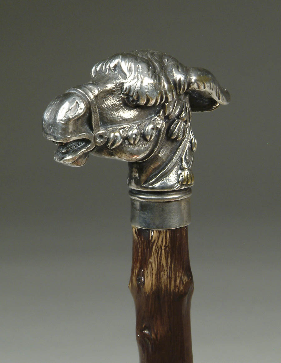 Appraisal: SILVER PLATED DONKEY HEAD CANE Cast plated donkey head has