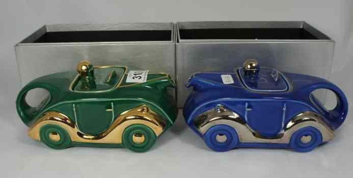 Appraisal: Sadler Car Tea Pots in Blue and Green KT Racing