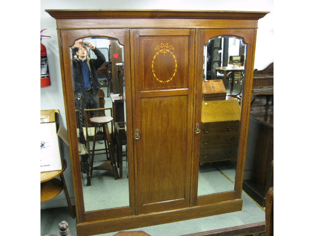 Appraisal: Edwardian mahogany three section double mirror door wardrobe with inlaid