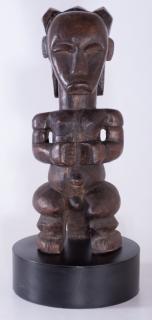 Appraisal: African Carved Wood Figure Carved wood African figural sculpture mounted