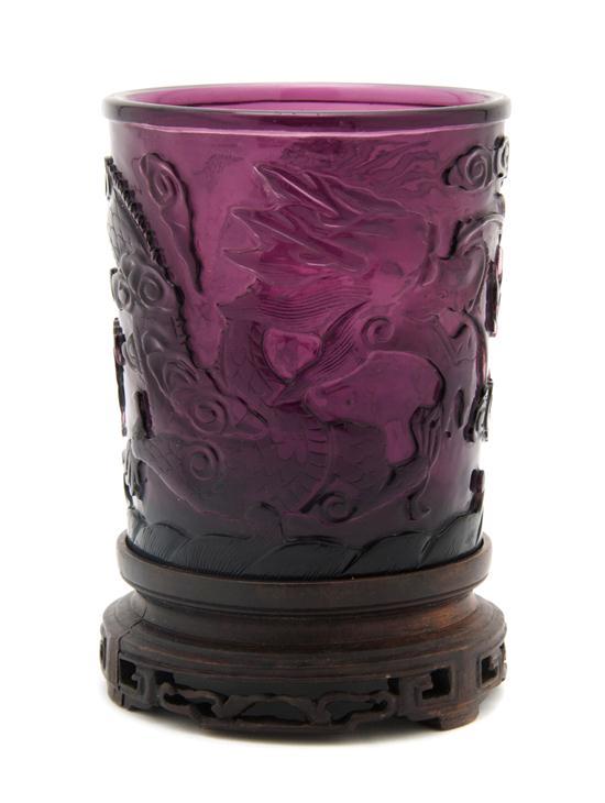 Appraisal: Carved Purple Peking Glass Cup th century of cylindrical form