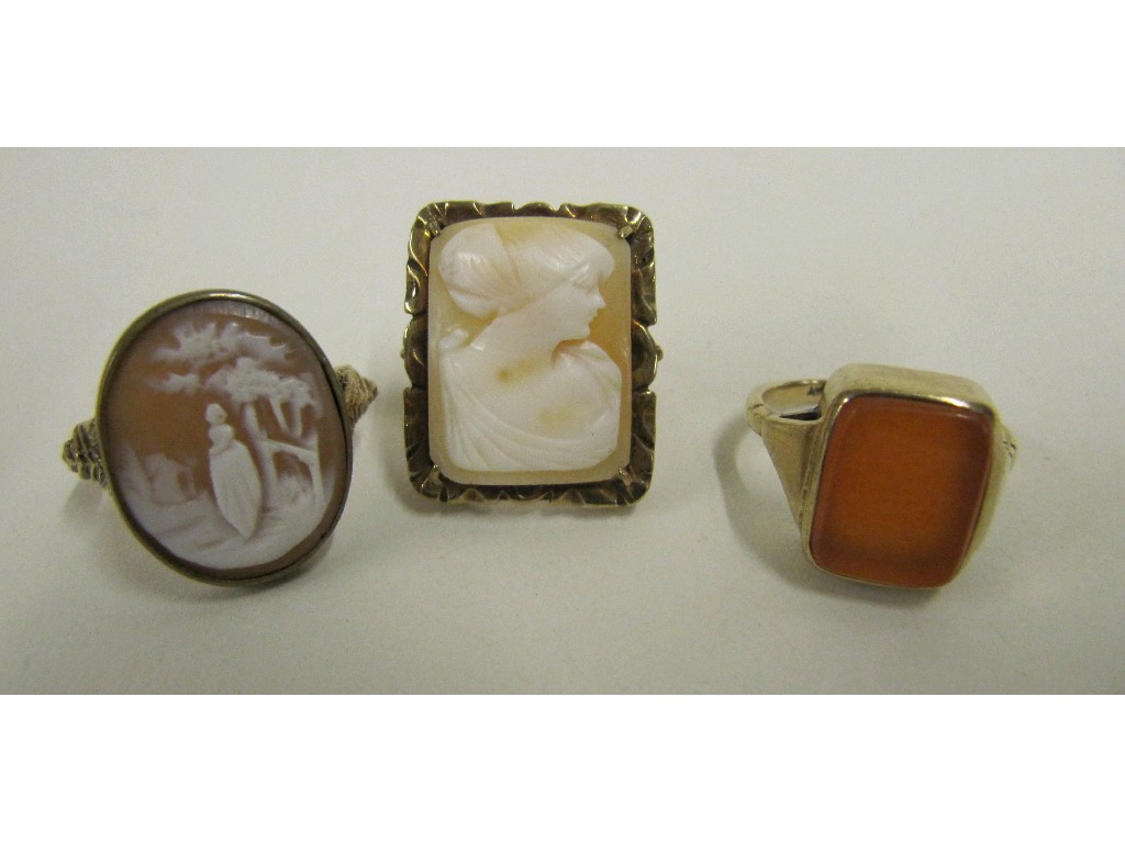 Appraisal: Lot comprising gents gold cornelian single stone ring and two