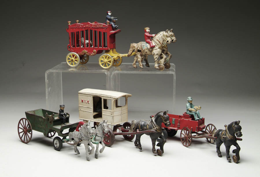 Appraisal: LOT OF HORSE DRAWN TOYS Consisting of Kenton Milk Wagon