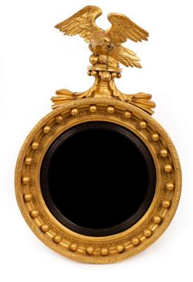 Appraisal: A Regency convex mirror the ball studded frame with eagle