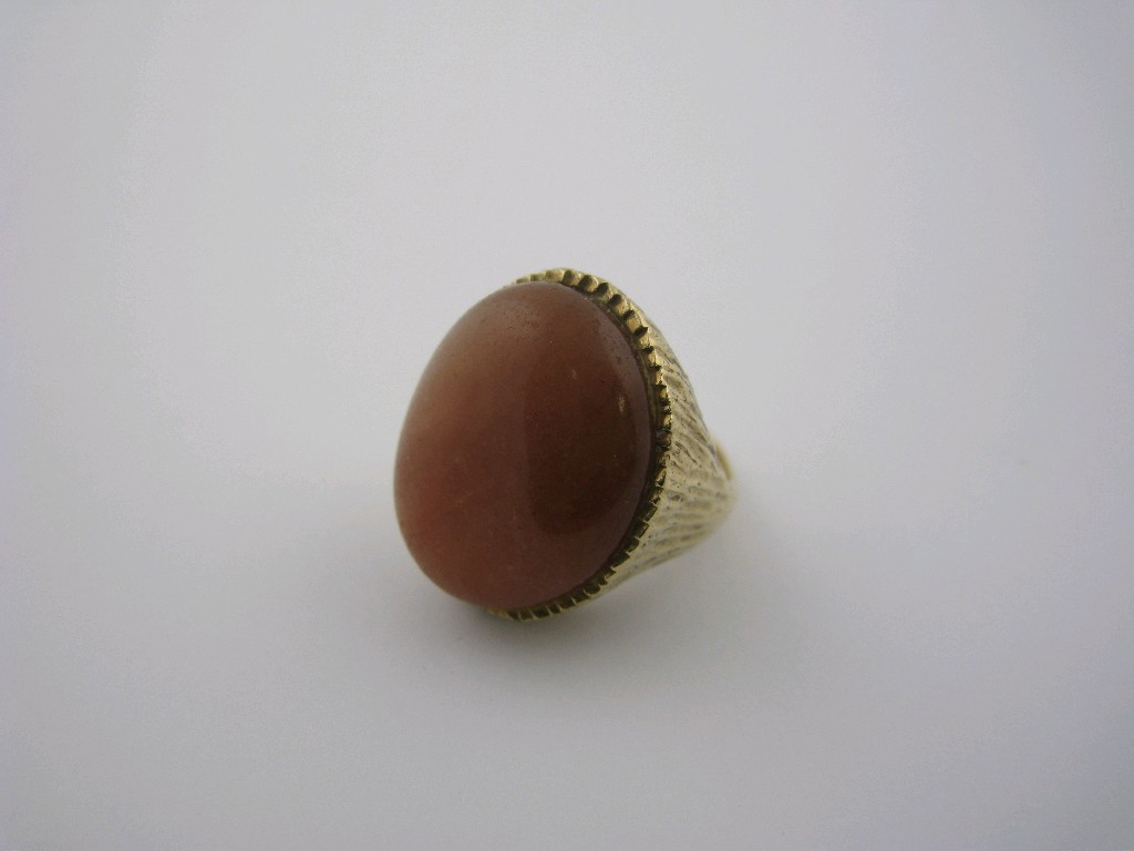 Appraisal: A Brown Cornelian Dress Ring set large oval pebble x