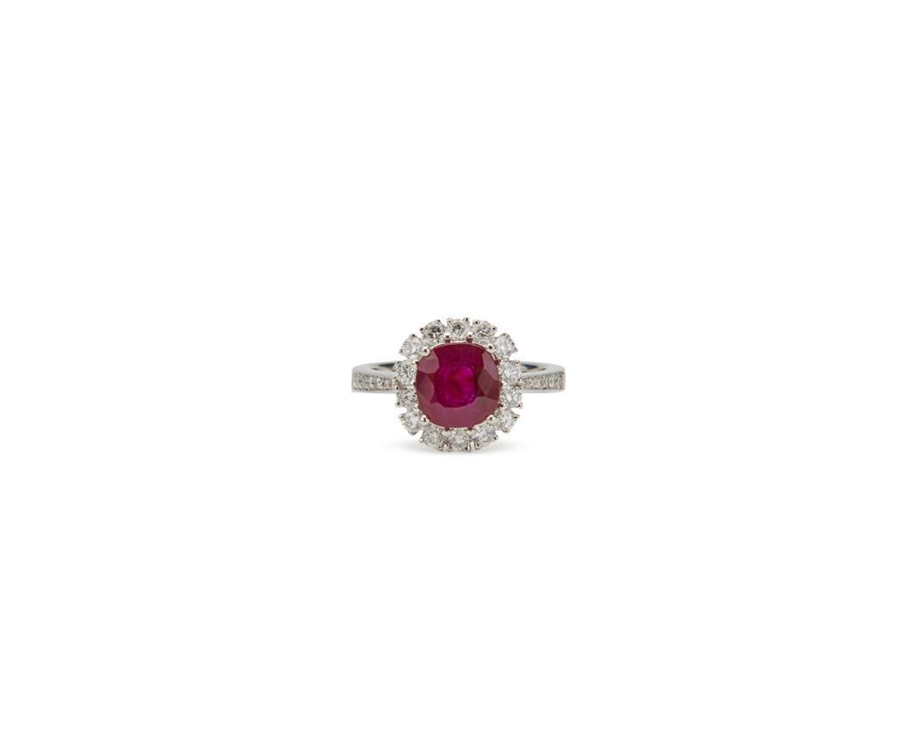 Appraisal: K Gold Ruby and Diamond Ring centering a cushion-cut ruby