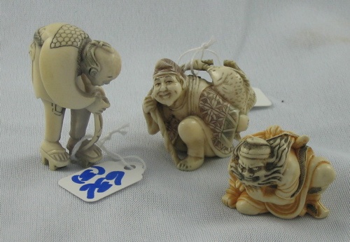 Appraisal: THREE ASIAN ELEPHANT IVORY FIGURES hand carved the first an