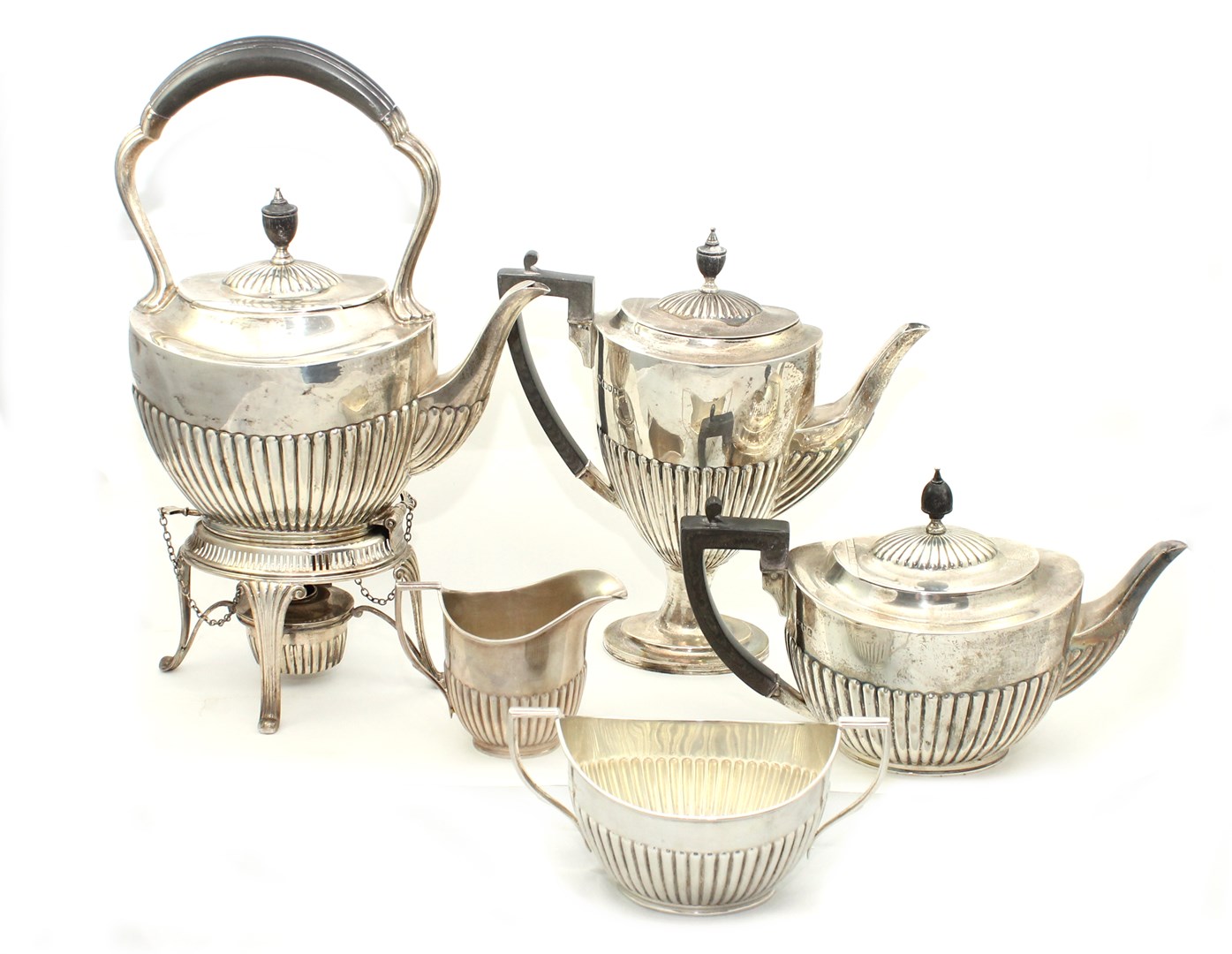 Appraisal: A silver composite five piece tea and coffee set comprising