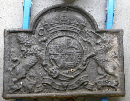 Appraisal: Cast iron fire back with coat of arms with lion