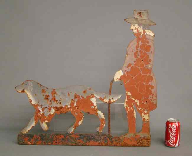 Appraisal: Sheet metal painted man walking dog weathervane '' W ''