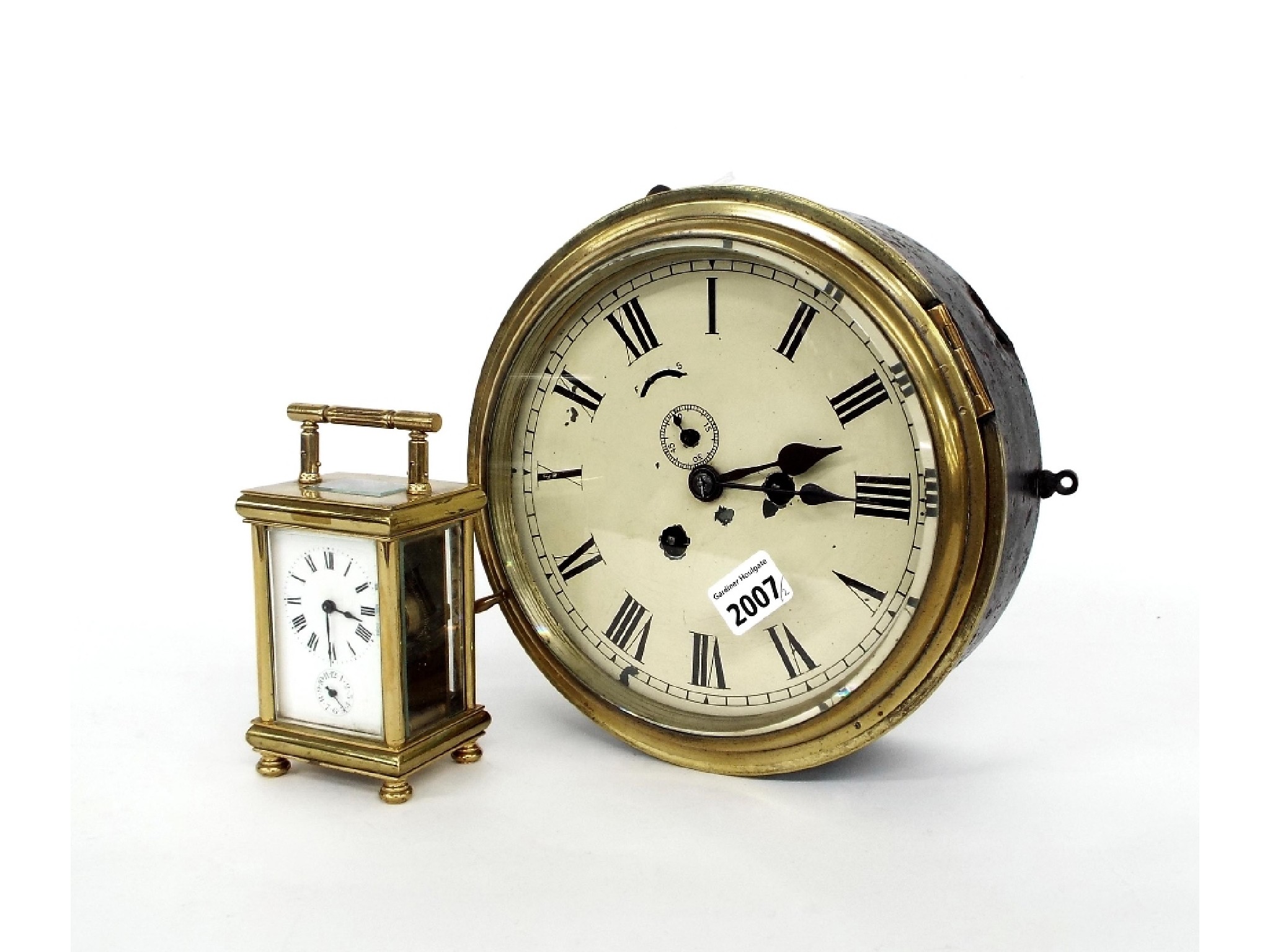 Appraisal: Bulkhead clock the cream dial with subsidiary seconds dial and