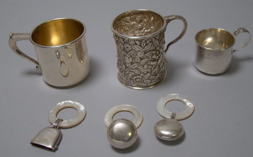 Appraisal: SIX STERLING SILVER BABY CUPS AND RATTLES Cup by S