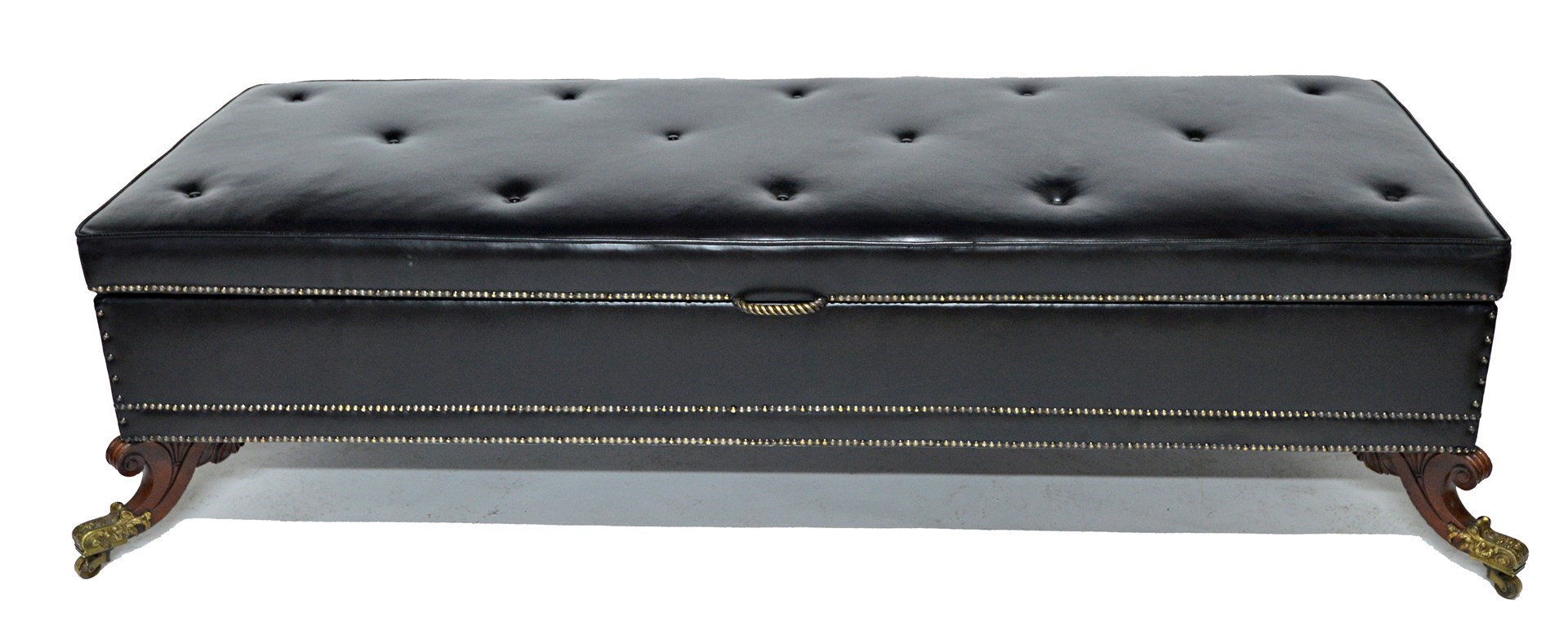 Appraisal: A large rectangular black leather upholstered lift top footstool on