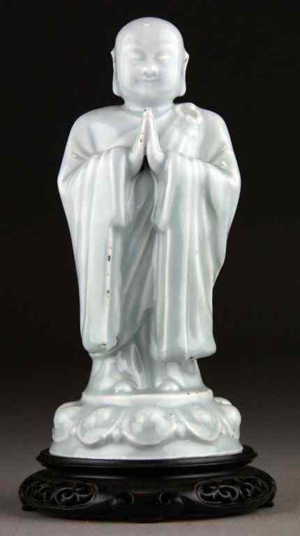 Appraisal: Rare Chinese Ming Longquan Porcelain FigureFinely molded to depict a