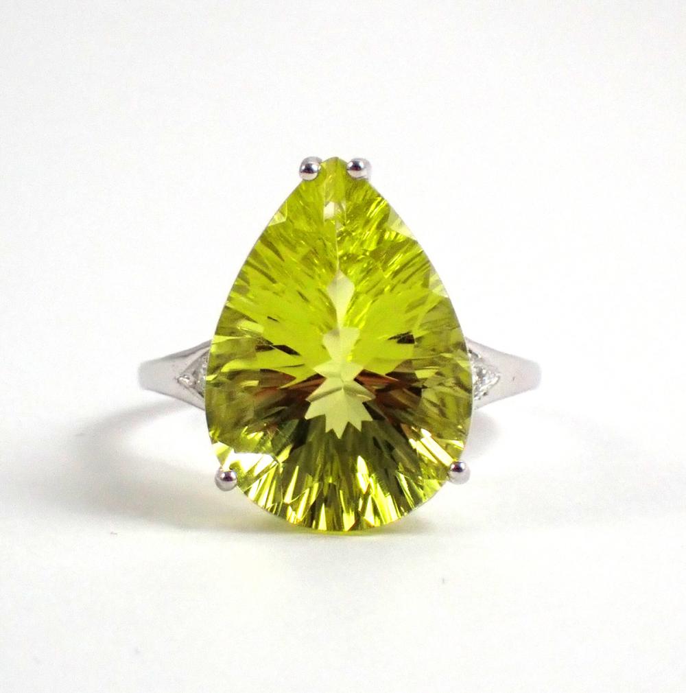 Appraisal: LEMON CITRINE DIAMOND AND FOURTEEN KARAT GOLD RING The k