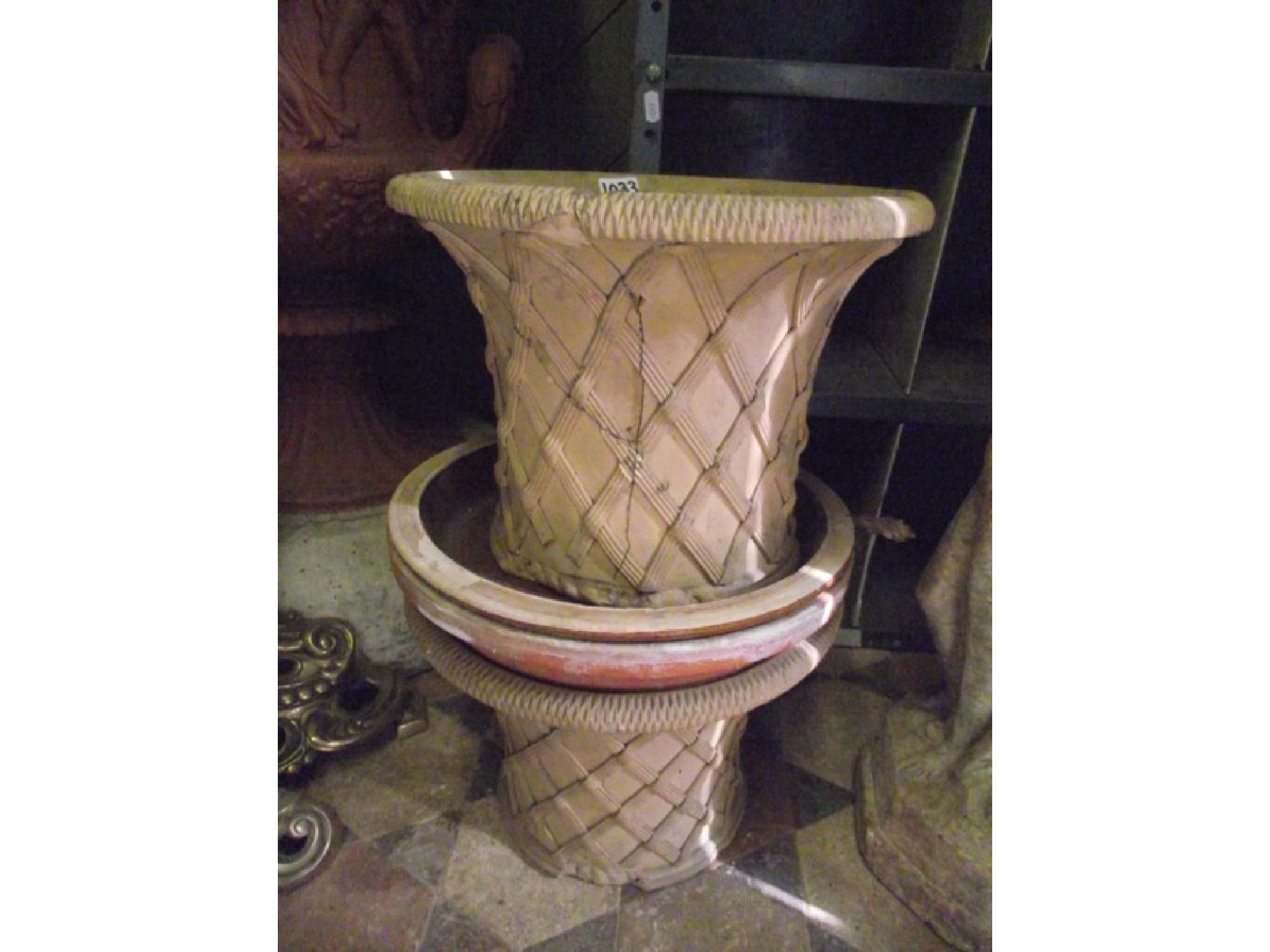 Appraisal: A pair of small buff coloured terracotta planters of circular