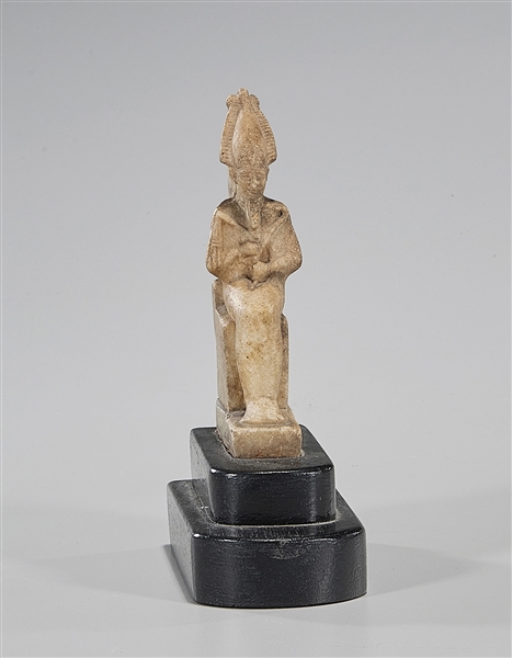 Appraisal: Egyptian Late Period mangnesite marble statuette of Osiris seated on