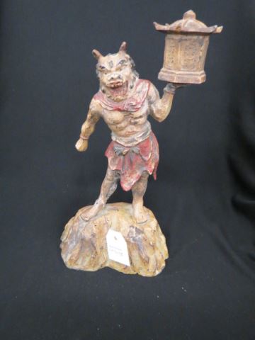 Appraisal: Cast Iron Figural Doorstop of a Devil standing on rock