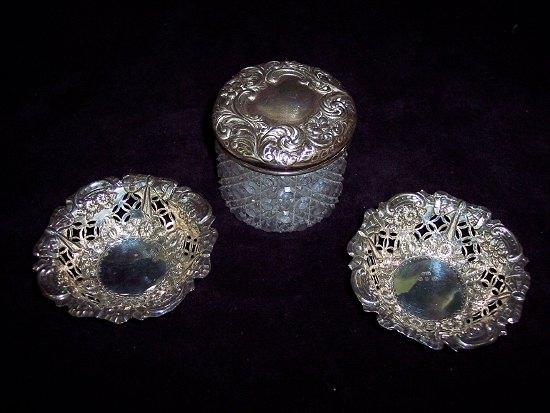 Appraisal: A pair of late Victorian pierced and embossed sweetmeat dishes