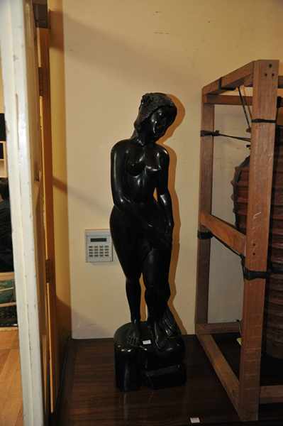 Appraisal: LARGE EBONISED CARVED WOODEN NUDE FIGURE