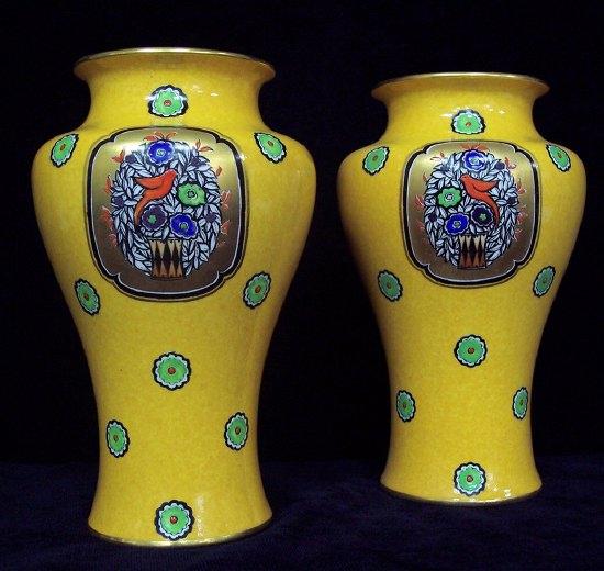 Appraisal: A pair of Royal Worcester baluster vases of yellow ground