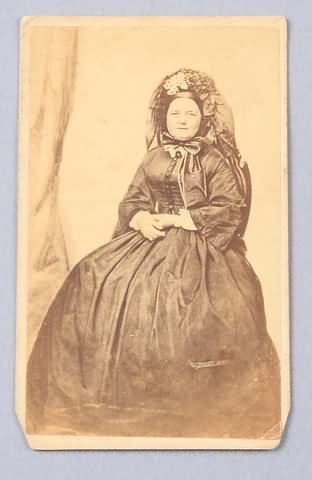 Appraisal: Carte-de-visite photograph of a near full length seated Mary Todd